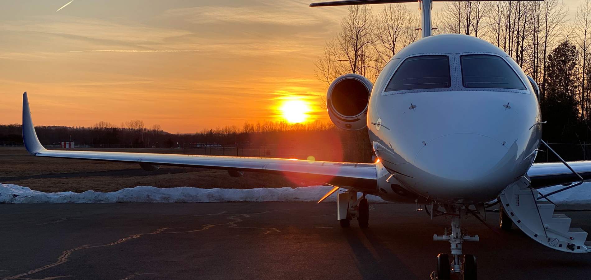 AirSprint Embraer Praetor 500 at sunset