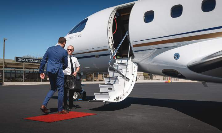 AirSprint passenger greeted by staff