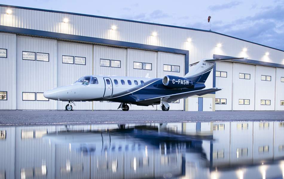 AirSprint Citation CJ2+ reflections at the YYC hangar