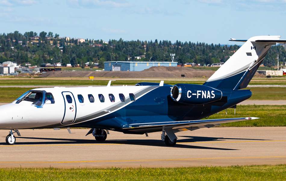 AirSprint Citation CJ3+ taxiing in Calgary International Airport