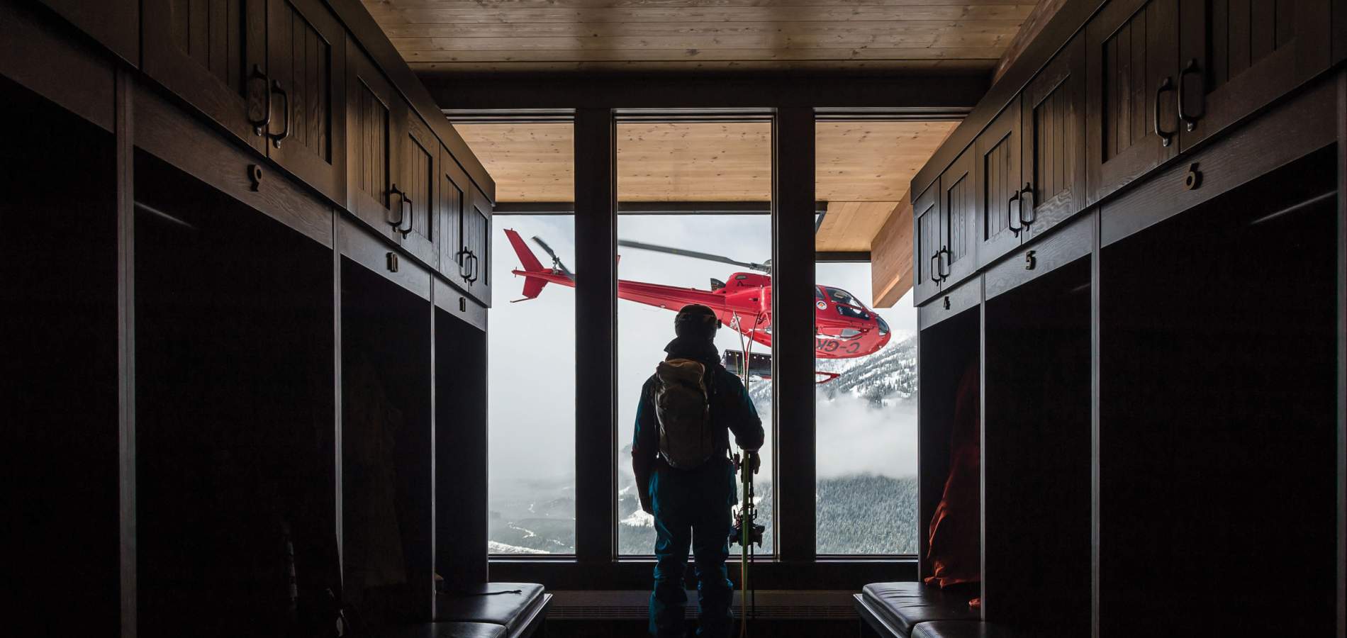 Guest Look Out Window At Helicopter | Mica Heli Skiing