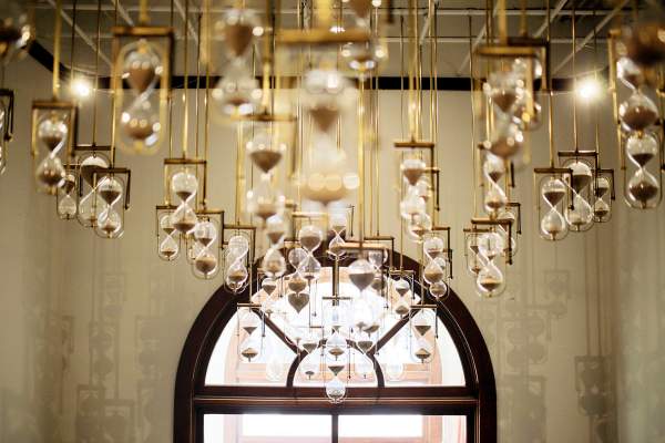 Dramatic hourglass art installation in the century-old building.